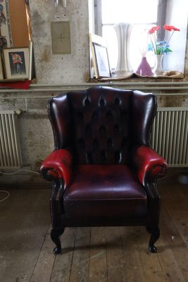 20th Century Red Wingback Armchair for sale at Pamono