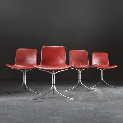 Mid Century Danish Leather and Steel Pk9 Chairs by Poul Kjaerholm