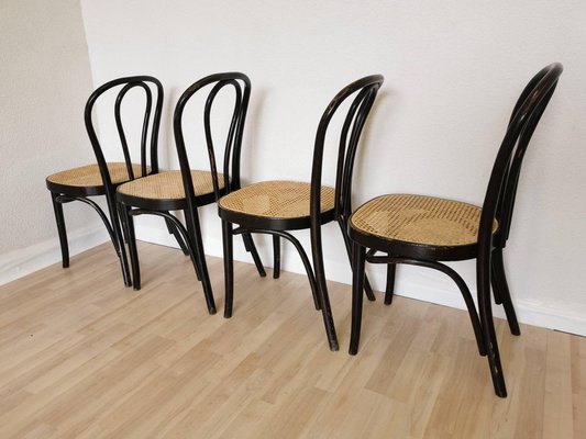 Wooden chair with cane seat deals