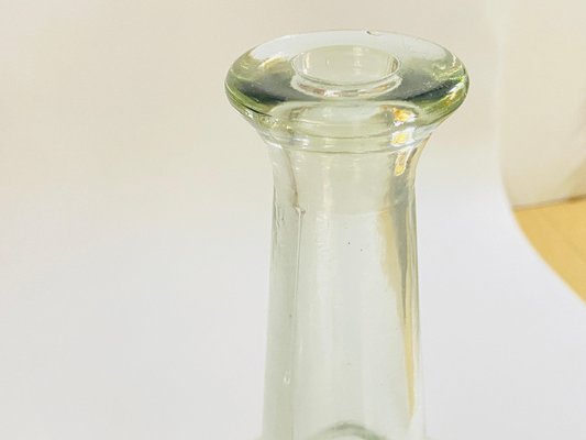 https://cdn20.pamono.com/p/g/1/6/1605197_yh2fksprk9/vintage-decorative-transparent-glass-bottles-in-glass-france-1960s-set-of-2-3.jpg