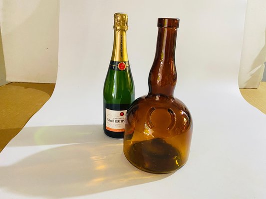 Botella francesa de vidrio de color marrón cobalto, años 30 venta Pamono