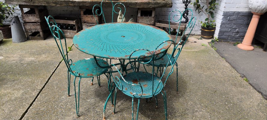 Tavolo e sedie da giardino in ferro battuto, anni '70, set di 5 in vendita  su Pamono