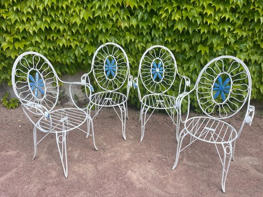 Vintage wrought iron table and chairs for sale deals