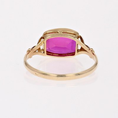 https://cdn20.pamono.com/p/g/1/6/1615606_9jz8fr5k5g/french-18-karat-yellow-gold-ring-with-red-gem-1930s-8.jpg