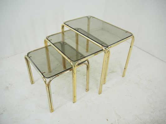 Mid-Century Brass & Smoked Glass Nesting Tables, 1970s, Set Mid-Century Brass & Smoked Glass Nesting Tables, 1970s, Set