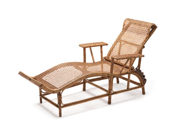 Rattan chaise deals longue