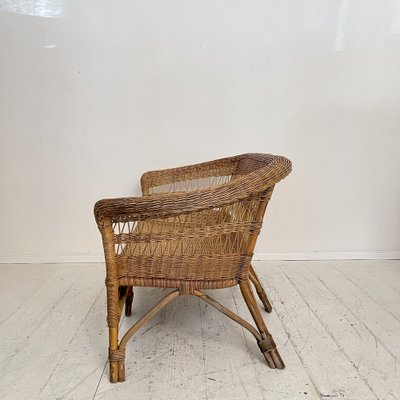 A Mid-Century French Rattan Sofa A Mid-Century French Rattan Sofa