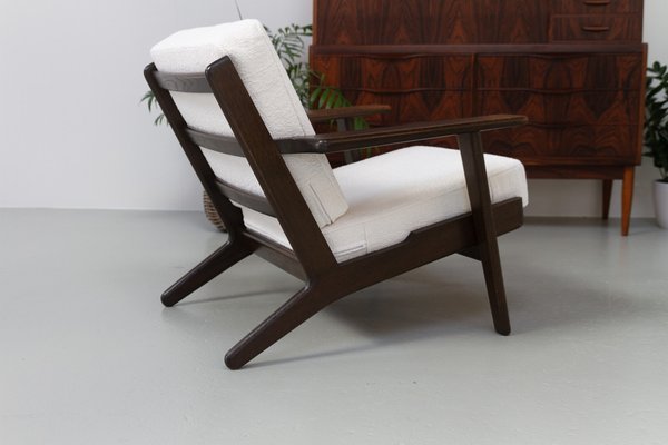 Dänischer Vintage Ge290 Sessel aus Eiche & Bouclé von Hans J. Wegner für Getama, 1960er bei Pamono kaufen