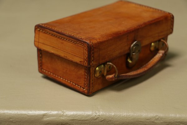 Small vintage leather suitcase hotsell