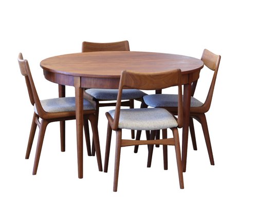 Danish Round Dining Table in Teak with Insert Plates 1960s Set