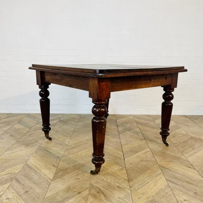 English Victorian Square Mahogany Dining Table on Brass Castors
