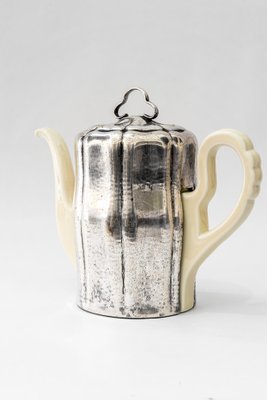 https://cdn20.pamono.com/p/g/1/6/1672675_1penv3u3l1/vintage-ceramic-thermos-coffee-pot-with-metal-cover-germany-1950s-4.jpg