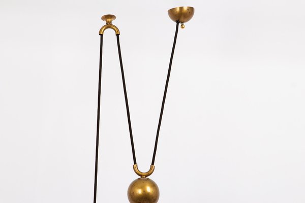 Art inspired by Marriage Necklace (Thali), late 19th century, India (Tamil  Nadu, Chetiar), Gold strung on black thread, Bottom of central bead to end  of counterweight: L. 33 1/4 in. (84.5 cm),