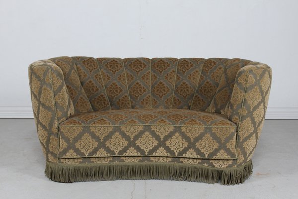 Art deco curved sofa discount