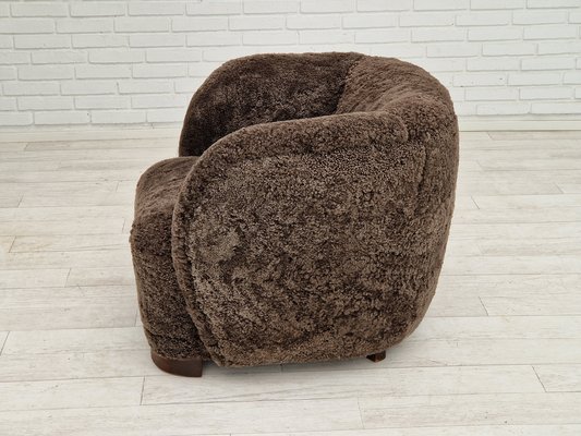 Gubi sheepskin chair deals