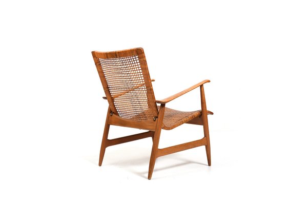 Cane Easy Chair attributed to Ib Kofod Larsen 1950s for sale at