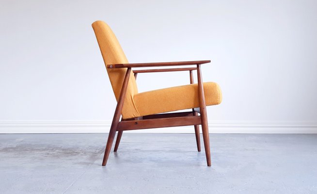 Yellow mid century armchair sales