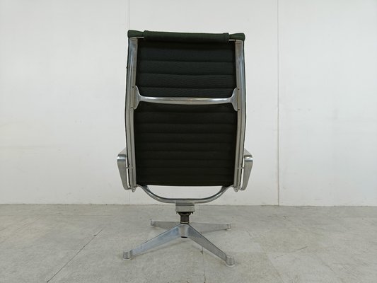 Ea124 Lounge Chair in Black Fabric by Charles Ray Eames for