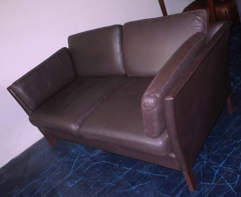 leather sofa with down cushions