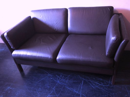 leather sofa with down cushions