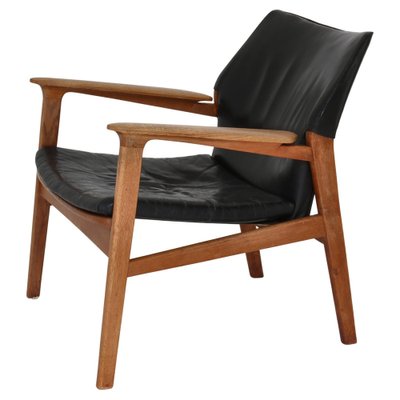 Danish Modern Lounge Chair in Patinated Oak Black Leather attributed to Hans Olsen 1950s