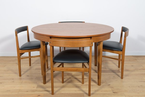 Mid century round dining table and chairs deals