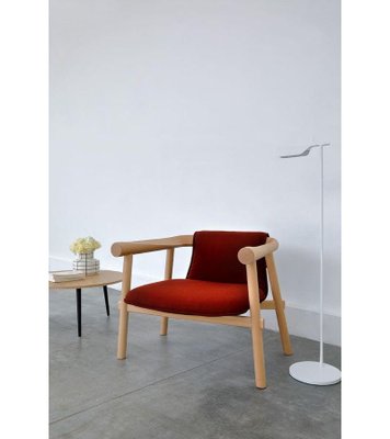 Poltrona Altay in tessuto di Patricia Urquiola in vendita su Pamono