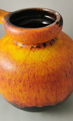 Fat Lava German Jug with Colored and Glazed Ceramic Handle for