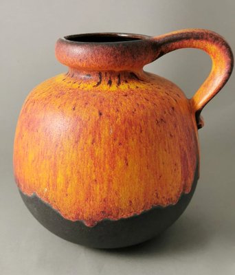 Fat Lava German Jug with Colored and Glazed Ceramic Handle for