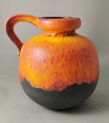 Fat Lava German Jug with Colored and Glazed Ceramic Handle for