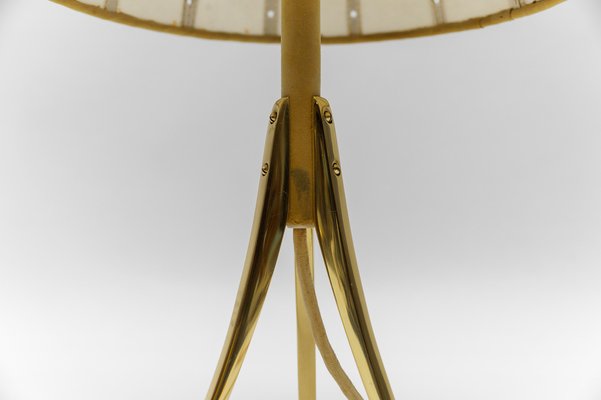 Antique brass outlet tripod floor lamp