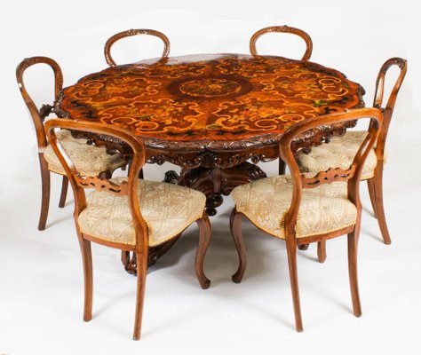 Antique walnut dining table and chairs online