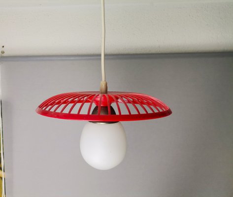 https://cdn20.pamono.com/p/g/1/7/1725139_hc68bnver9/mid-century-kitchen-table-hanging-lamp-in-red-plastic-1960s-2.jpg