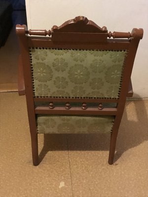 Antique chairs with casters on front store legs only