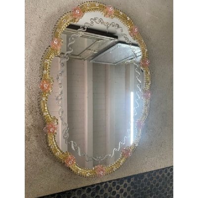 Espejo tallado ovalado