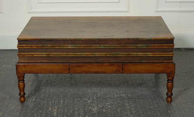 Antique coffee outlet table with storage