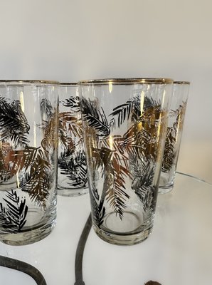 https://cdn20.pamono.com/p/g/1/7/1735442_wv9flql0cg/mid-century-danish-black-and-22k-gold-leaf-glasses-1960s-set-of-6-2.jpg