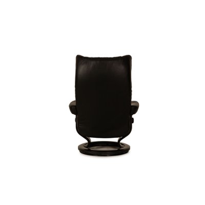 Black armchair and footstool sale