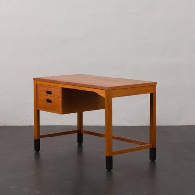 Small Danish Teak Desk with Black Handles and Feet by Nipu Mobler
