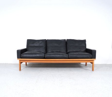 Vintage black leather sofa top