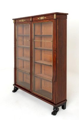 Antique bookcase with glass sale doors for sale