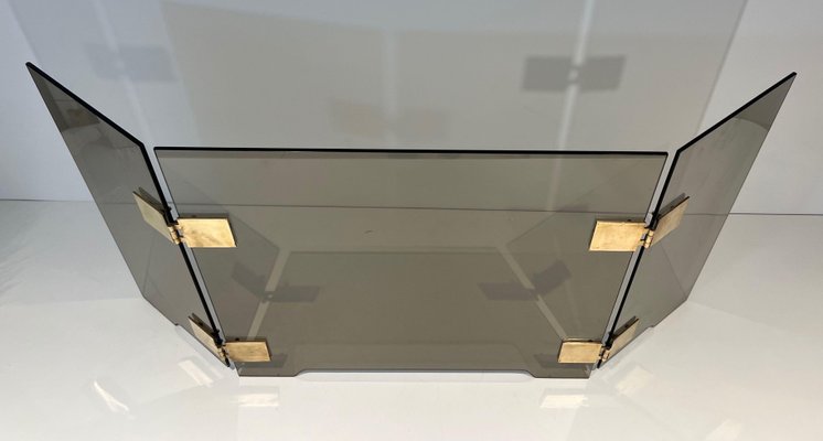 Three Leaf Glass & Brass Fire Screen Attributed to Jacques Adnet Three Leaf Glass & Brass Fire Screen Attributed to Jacques Adnet