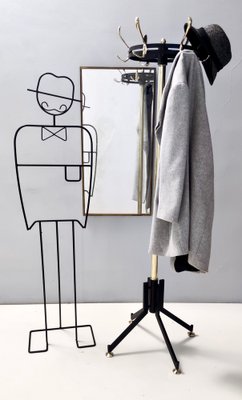 Revolving coat rack hotsell