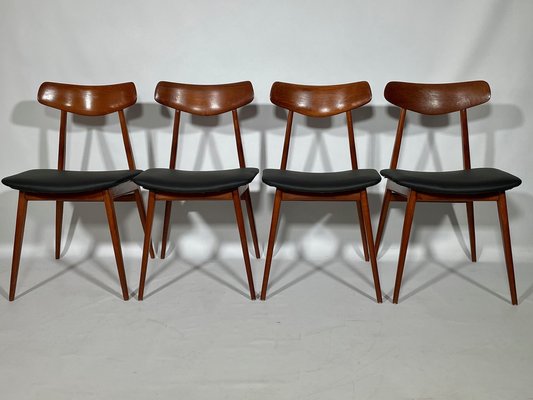 4 mid 2024 century dining chairs