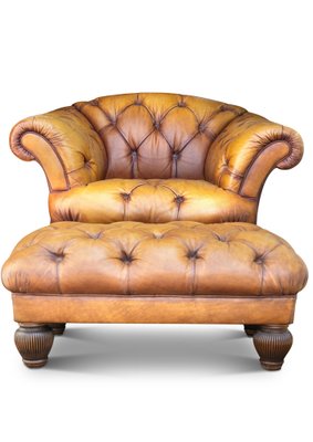 Leather armchair with sale footrest