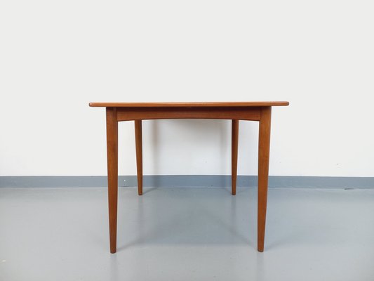 Square dining table with outlet leaf extension