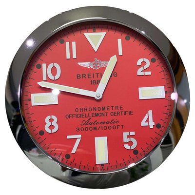 Orologio da parete cronometro con quadrante rosso e lunetta scanalata di  Breitling in vendita su Pamono