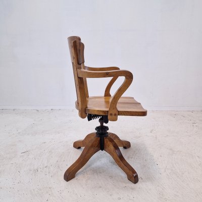 Industrial Oak Swivel Chair, 1900s for sale at Pamono