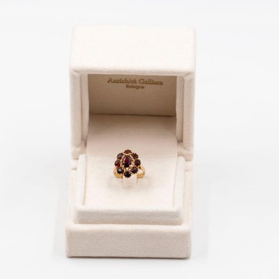 Anello in oro giallo a 8 carati e margherita granata anni 70 in