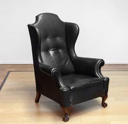 19th Century Black Leather Chippendale Wingback Chair with Claw and Ball Feet for sale at Pamono